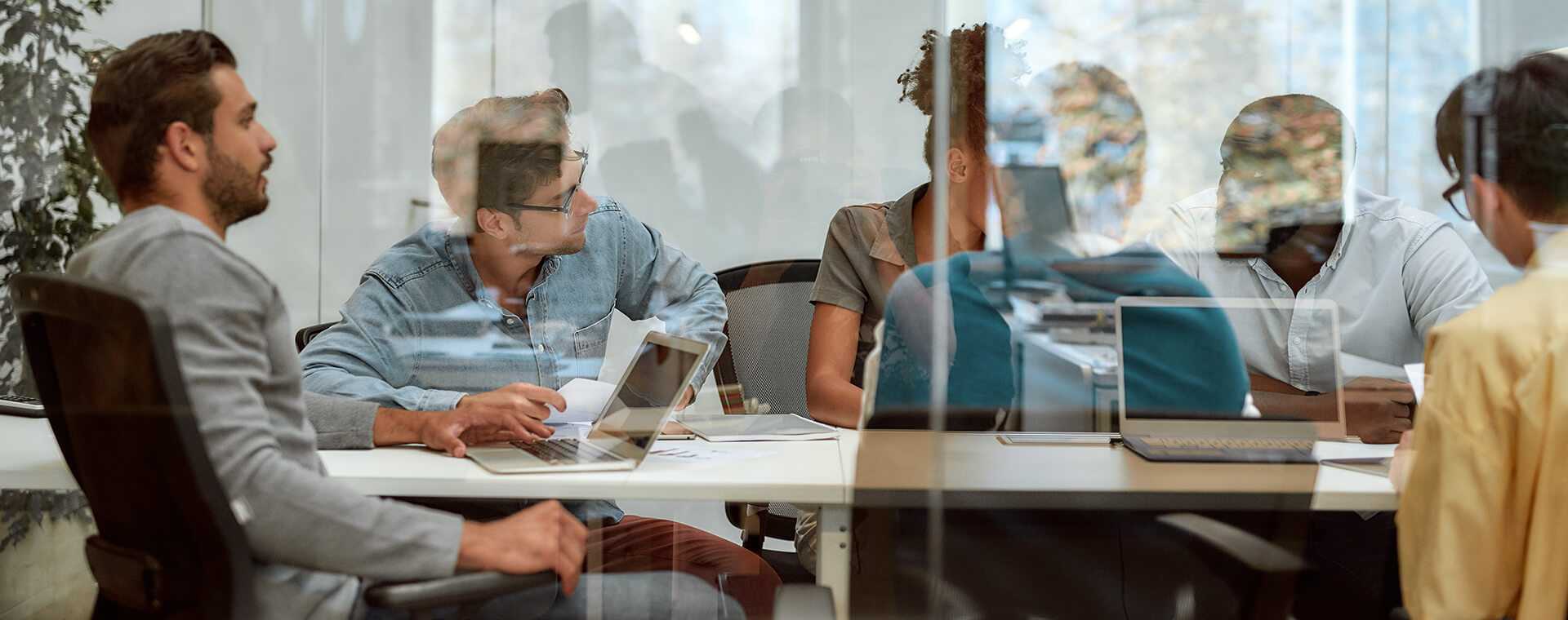 A marketing team having a meeting around a table